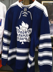 Leafs sweater signed by Baun, Bower and Jeffrey